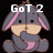 Pixelated cartoon donkey with pink inner ears and a pink belly, covering its mouth with one arm, displayed in a with text overlays