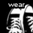 Black-and-white pixelated image of a shoe with text overlays, showing animation where text changes from 'wear' to 'converse' and 'with style'.