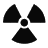 Four views of a radiation symbol with varying grayscale levels and one grayed-out