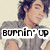 Pixelated image of a person with shoulder-length hair wearing a gray top, overlaid with text reading 'burnin' up'.