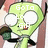 Green cartoon character with large white eyes and a small mouth, holding a dark green object in its right hand.