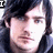 A pixelated image of a person with long dark hair, showing three variations where text labels change from 'II' to 'Love' and 'Adam'.