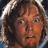Pixelated close-up of a cartoon character's face with brown hair and wide eyes, displayed as a static buddy icon.