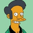 Pixelated cartoon character with dark hair and green shirt on light blue background, next to green with white text