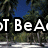 Pixelated landscape with palm trees and blue sky, overlaid with white text fragments on black outlines.