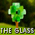 Pixelated green tree with brown trunk on dark background, text "THE GLASS IN THE TREES!!!!" in white block letters.