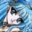 Pixelated image of a character with dark hair and light skin against a blue background, featuring visible pixelation and color blending.