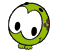 Pixelated green cartoon character with white face, black oval eyes, and red accents on a transparent background.