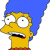 Pixelated yellow-skinned character with blue hair, wide eyes, open mouth showing black interior and red tongue, wearing red clothing, against white background.