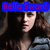 A pixelated image of a person with long brown hair wearing a blue denim jacket, with blue text reading "Bella Swan!" at the top and a blue banner with red hearts below.