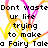 Pixelated text reads 'Don't waste your life trying to make a Fairy Tale' on left and 'When it wants to happen it will come.' on right, overlaid with yellow and pink X-shaped lines.