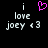 Pixelated text reads 'i love joey <3' with a pink heart symbol replacing the word 'love' in the second instance, all on a black background.