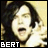 A 48x48 pixel animated contact sheet showing two sequential frames of a person with long dark hair and an open mouth gesture, displayed side-by-side on a yellow background with "BERT" text at the bottom left of each frame.