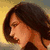 A pixelated image of a woman with brown hair in profile, next to blue text reading Wolf Girl and red text reading TGM's Most Wanted on black backgrounds.