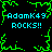 Pixelated green border frames cyan text reading "AdamK49 ROCKS!!" repeated four times on a black background with central green splatter effect.