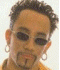 Six distinct head-and-shoulders portraits of young men in various poses and expressions, each with unique hair styles and clothing against different backgrounds.