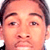 Static 50x50 pixel icon showing a close-up of a person's face with dark hair, visible eyebrows, eyes, nose, mouth, and ears against a white background.