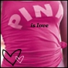 A pink shirt with 'PINK' text and 'is Love' phrase, featuring two heart symbols, one black outline and one pink outline.