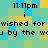Pixelated text displays '11:11pm i wished for by the wu' over a of cyan, yellow, and green squares