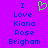 A static pixel art image with a bright purple background displaying blue text and a green heart symbol.