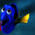 Pixelated blue fish character with large eyes and yellow tail fin against dark blue background.