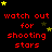 Red pixelated text "watch out for shooting stars" repeated across a black background with scattered yellow and green star icons.