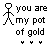 Pixelated stick figure with multicolored head and limbs stands beside text reading "you are my pot of gold" on white background.