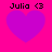 Four identical pixelated heart icons with 'Julia <3' text above each, displayed on a bright pink background.