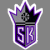 Pixelated shield-shaped icon with purple and white borders, dark gray central cross, black top section, and stylized 'SK' letters in purple on a lighter purple background.