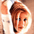 A pixel shows a blonde woman's face in four views: top-left with a white sleeve, top-right with red lips, bottom-left with a neutral expression, and bottom-right blank