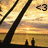 Sunset scene with silhouetted figures on a pier, transitioning from two to three people as the animation progresses.