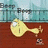 Animated yellow cartoon character with large eyes and a small body on brown ground, background shows blurred cityscape with repeated 'Bleep' text.