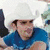 A pixelated image of a person in a white cowboy hat and blue shirt with text reading "I Love Brad Paisley" on the right side.