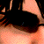 Pixelated character face with dark hair and sunglasses in three sequential views showing head movement from left to right, alongside a separate logo featuring 'Sims 2' text.