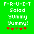 Green background with white pixelated text F-R-U-I-T Salad Yummy Yummy! and red/brown asterisks, showing animation change in the second of asterisks