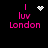 Pixelated pink text 'I luv London' on black background with animated white pixel symbols above 'I'.