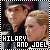 Pixelated static image of two people with text overlay in a stamp-like border, likely an AOL Instant Messenger buddy icon from the early 2000s.