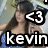 Pixelated image of a person with long dark hair wearing a light-colored top and blue garment, overlaid with large white text elements.