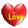 Three red heart-shaped icons with glossy surfaces arranged in a , one displaying yellow text