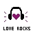 Pixel art icon featuring black headphones with a purple heart at center, flanked by sound wave patterns and 'LOVE ROCKS' text below.