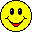 Three yellow pixelated smiley faces with black outlines display distinct expressions: one smiling, one grinning with red checkered cheeks and visible teeth, and one sticking out its tongue.