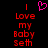 Pixelated red text on black background with pink heart symbol above, displaying 'I Love my Baby Seth' in two identical vertical