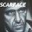 Pixelated static icon with white text "SCARFACE" above a grayscale face rendered in low-resolution blocky pixels, set against dark background.