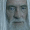 Two static show a character with long white hair and beard; the lower displays text reading 'Gandalf the White' over a brown background