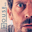 A pixelated close-up of a person's face with visible eye, nose, and mouth details alongside vertical text reading 'HOUSE OF' on the left.