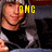 A pixelated image of a person with light hair wearing dark clothing, showing text overlays in yellow block letters across different sections.