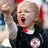 Pixelated image of a person with light hair wearing dark clothing and red accents, mouth open in an expressive gesture.