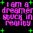 Pixelated text reads "I am a dreamer stuck in reality" with green plus signs on black background, repeated four times.