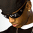Animated sequence showing a person in dark clothing and sunglasses with subtle head movement against white background.