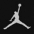 Pixelated white silhouette of a basketball player mid-jump on black background with partial text fragments.